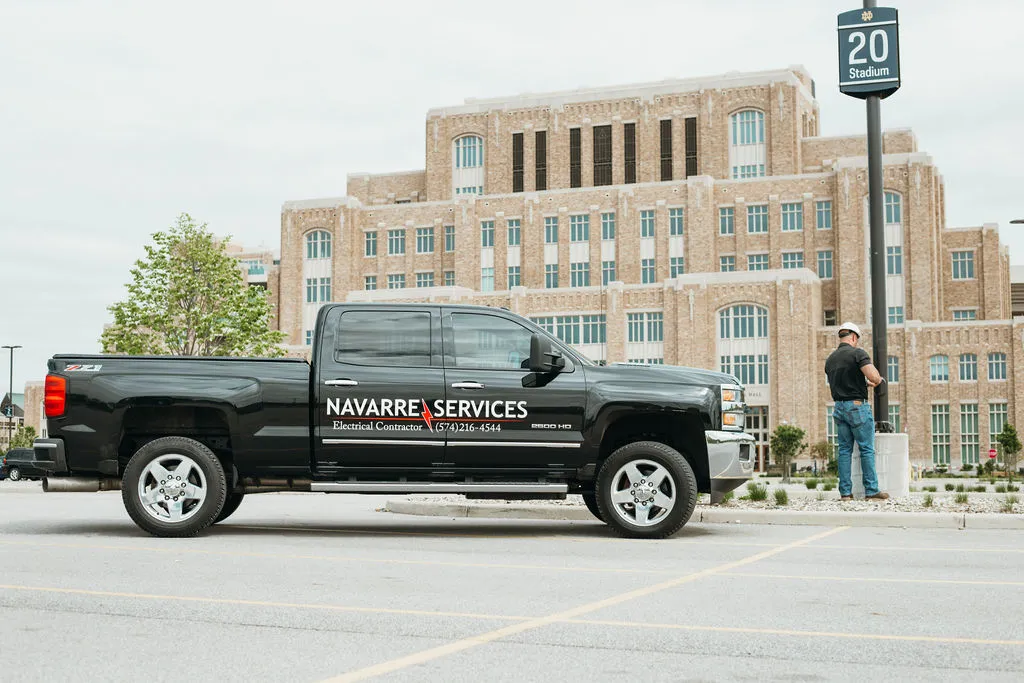 Navarre Services electricians on a commercial job site